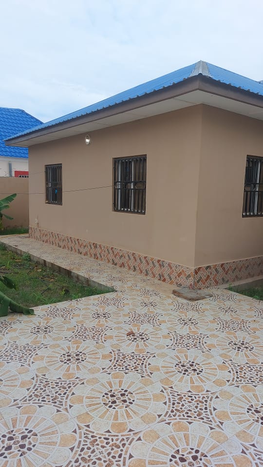 NEWLY BUILT THREE BEDROOMS HOUSE FOR SALE AT KOLOLI 300 METERS FROM BARS AND RESTURANTS