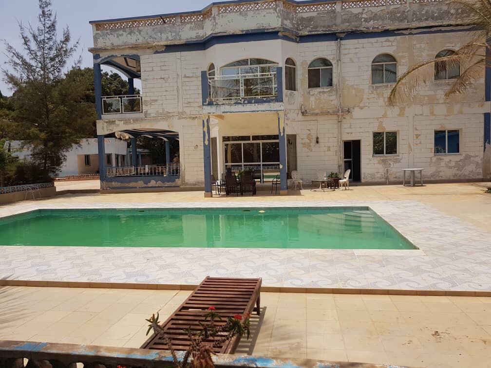 HOUSE FOR SALE AT BRUFUT WITH A SWIMMING POOL AND THE LAND SIZE IS 60 X 50 METERS