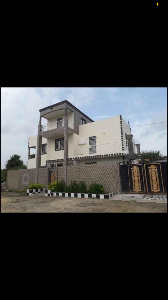 four bedrooms funished house at Paradise for sale price D10million with negotiations 